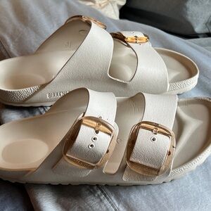 Birkenstock Cream Arizona Sandals with Gold Buckles